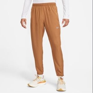 Nike Men’s challenger pants, size MEDIUM, new with tags. Great color.